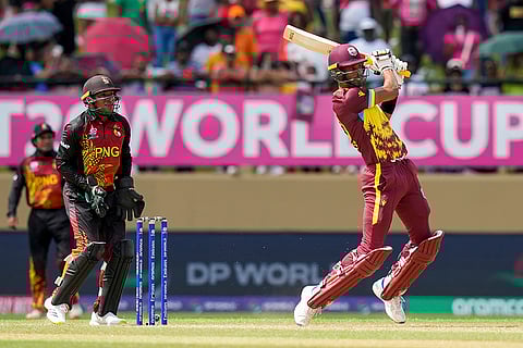 Roston Chase plays a shot against PNG
